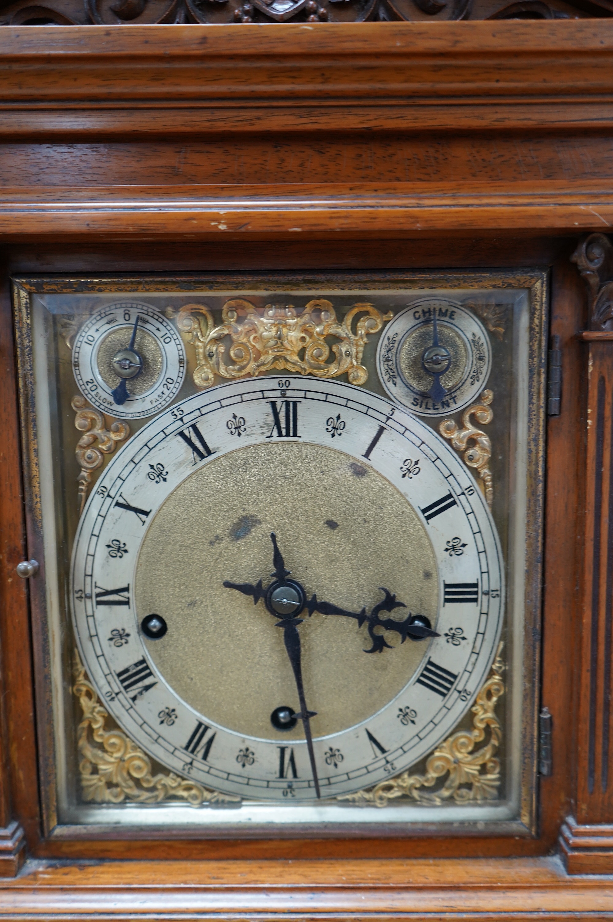 A late 19th century German mahogany W and H clock with a three train movement, striking and chiming on five coiled gongs, 42cm. Condition - fair to good, not tested, but understood from the vendor to be in working order